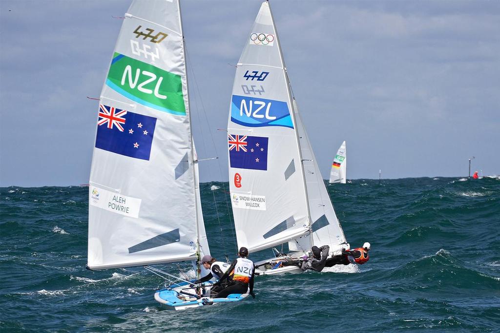 Paul Snow-Hansen and Dan Willcox, and Jo Aleh and Polly Powrie tune up before the start of racing in the mens and Women 470 sailing in 3-4 metre swells and 25kt winds on Day 4 of the 2016 Summer Olympics © Richard Gladwell www.photosport.co.nz